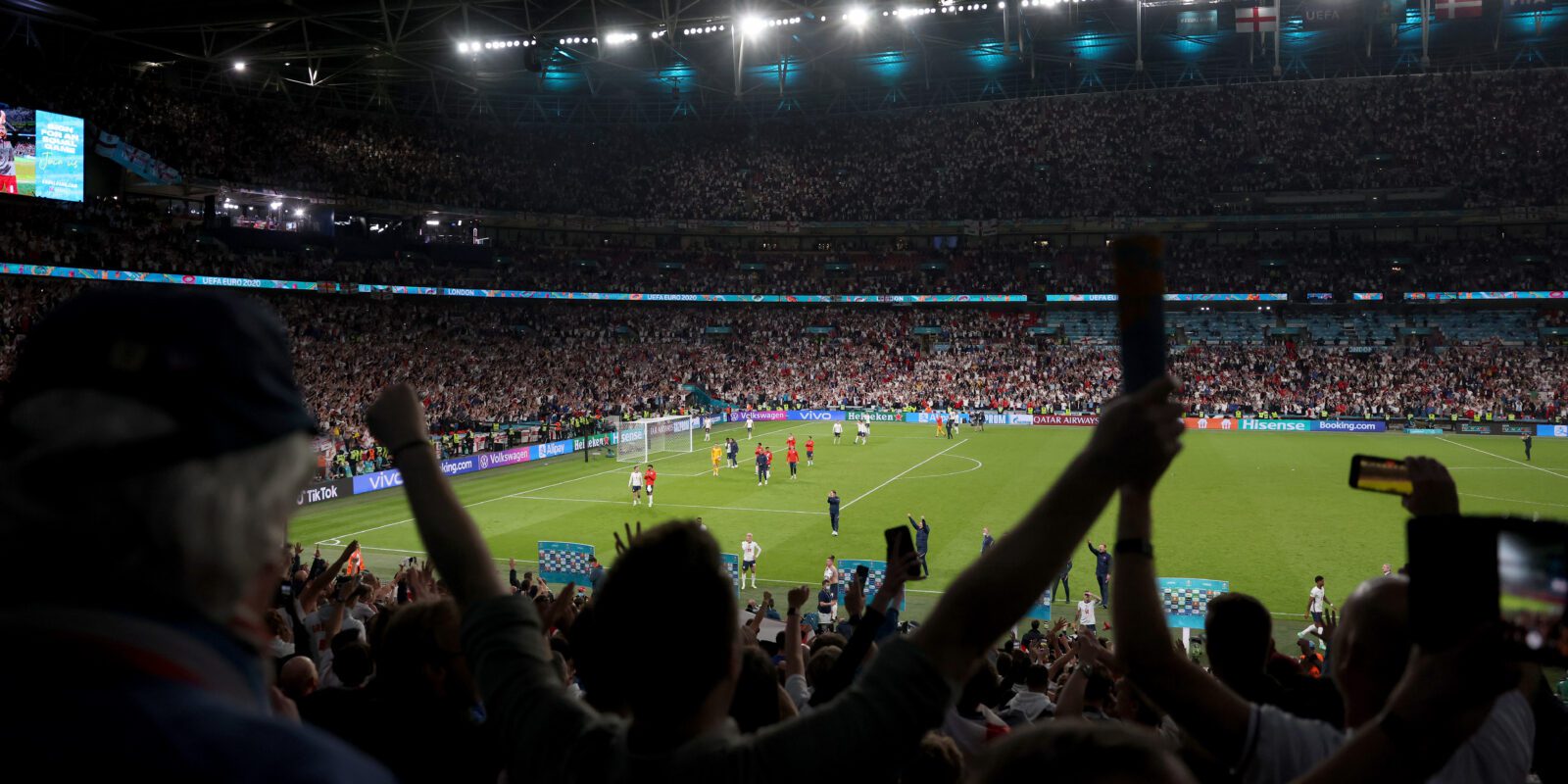 England fans cheering at Wembley Stadium during the UEFA Euro 2020 Semi Final between England and Denmark